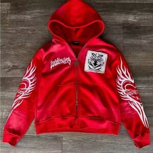 Vibrant Red Hoodie with White Tribal Design
